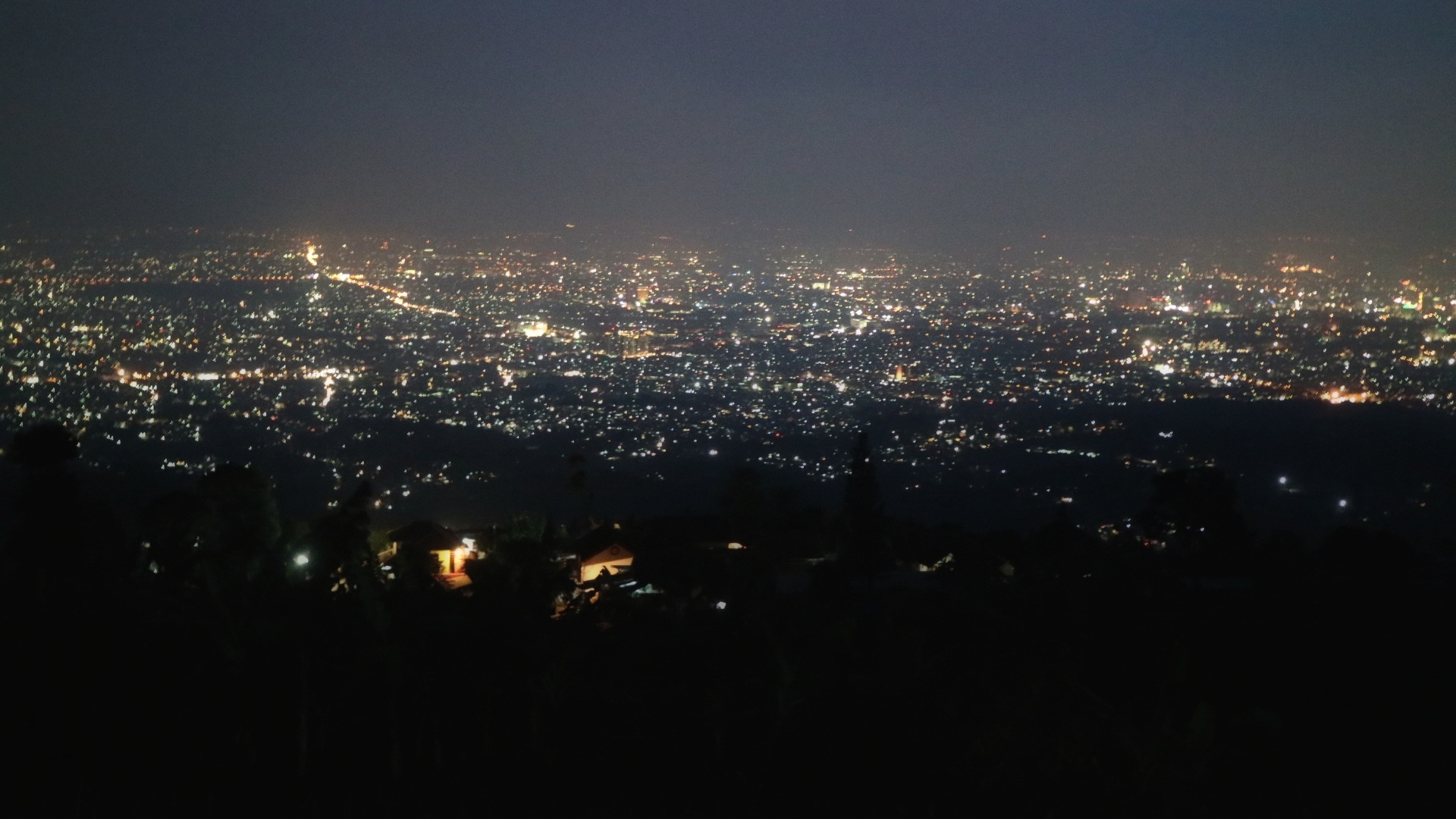 Bandung city lights seen from the hills after dark. Photograph by Farid Rafif, CC BY-SA 4.0.